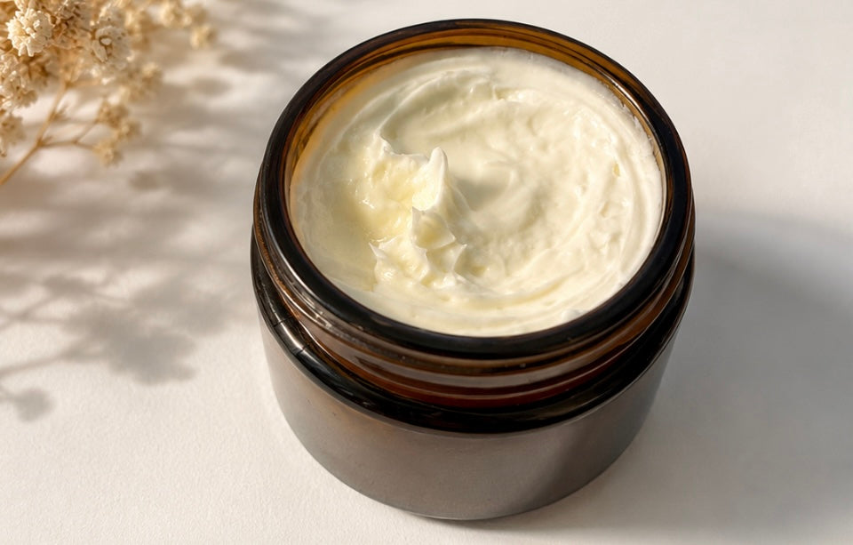 Handmade grass fed tallow body lotion open jar small batch travel size 2oz
